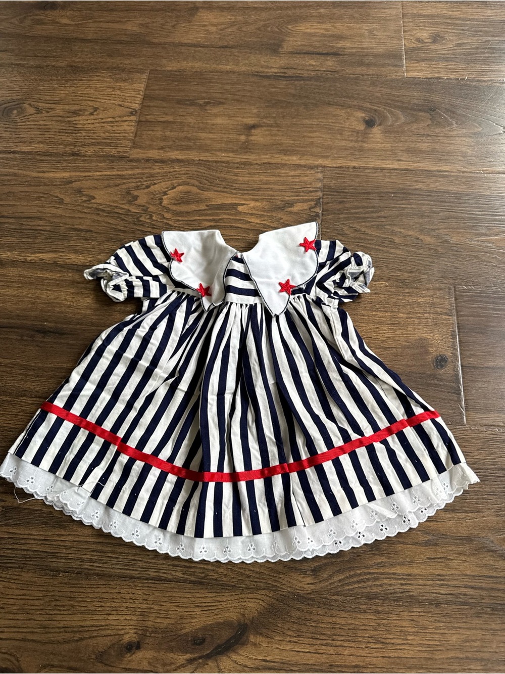 Navy and White Striped Vintage-Inspired Dress with Red Accents